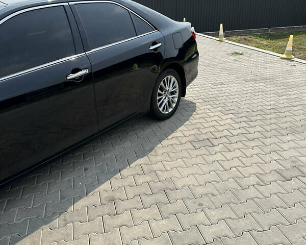 Черный Тойота Камри, объемом двигателя 2.5 л и пробегом 168 тыс. км за 18500 $, фото 4 на Automoto.ua