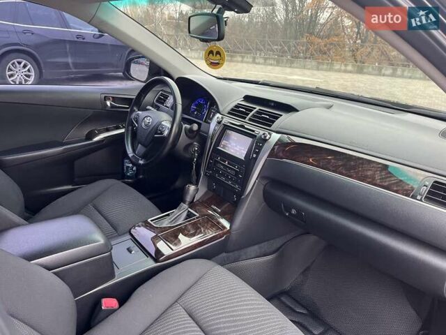 Черный Тойота Камри, объемом двигателя 2.5 л и пробегом 165 тыс. км за 16600 $, фото 16 на Automoto.ua