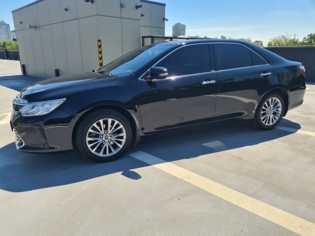 Черный Тойота Камри, объемом двигателя 2.5 л и пробегом 230 тыс. км за 16990 $, фото 1 на Automoto.ua