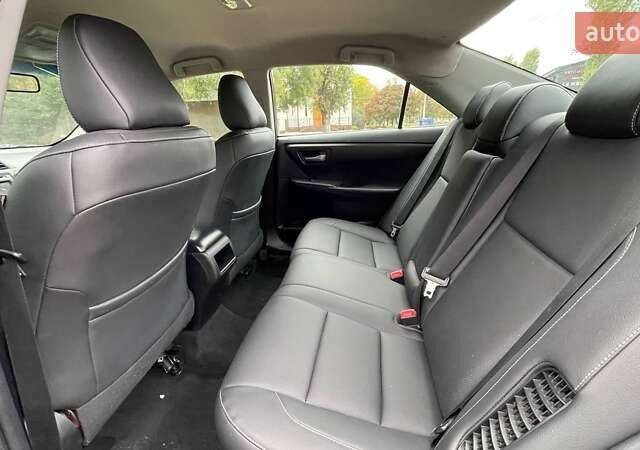 Черный Тойота Камри, объемом двигателя 2.5 л и пробегом 205 тыс. км за 12500 $, фото 2 на Automoto.ua