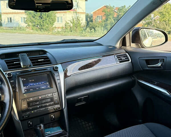 Чорний Тойота Камрі, об'ємом двигуна 2.49 л та пробігом 129 тис. км за 18000 $, фото 18 на Automoto.ua