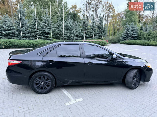 Черный Тойота Камри, объемом двигателя 2.5 л и пробегом 227 тыс. км за 14000 $, фото 18 на Automoto.ua