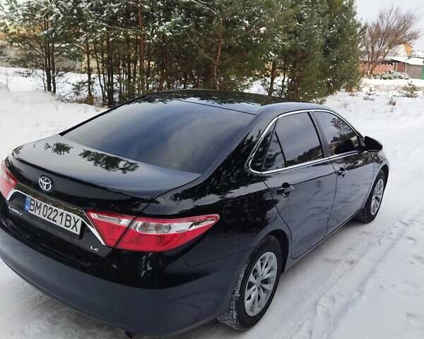 Черный Тойота Камри, объемом двигателя 2.5 л и пробегом 142 тыс. км за 15800 $, фото 2 на Automoto.ua