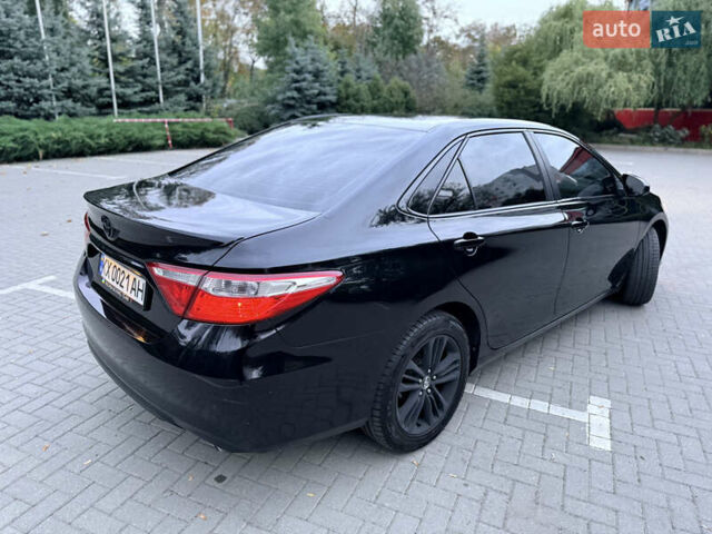 Черный Тойота Камри, объемом двигателя 2.5 л и пробегом 227 тыс. км за 14000 $, фото 15 на Automoto.ua