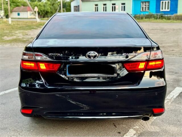 Черный Тойота Камри, объемом двигателя 2.5 л и пробегом 157 тыс. км за 16200 $, фото 5 на Automoto.ua