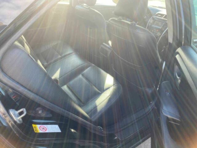 Черный Тойота Камри, объемом двигателя 2.5 л и пробегом 73 тыс. км за 5300 $, фото 8 на Automoto.ua