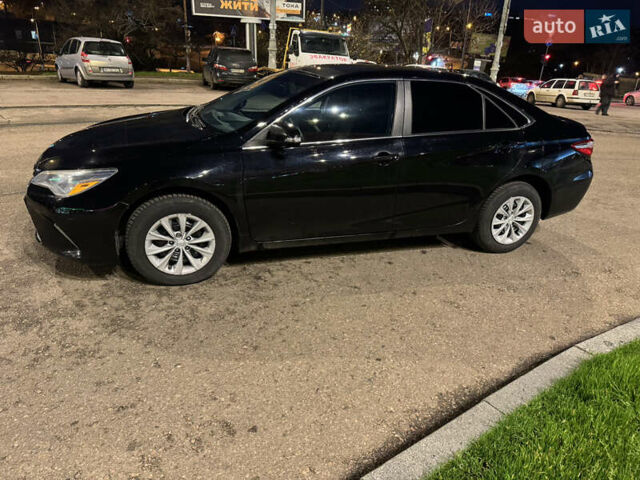 Черный Тойота Камри, объемом двигателя 2.49 л и пробегом 122 тыс. км за 13500 $, фото 1 на Automoto.ua