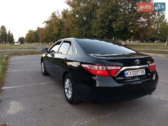 Чорний Тойота Камрі, об'ємом двигуна 2.49 л та пробігом 230 тис. км за 13000 $, фото 1 на Automoto.ua