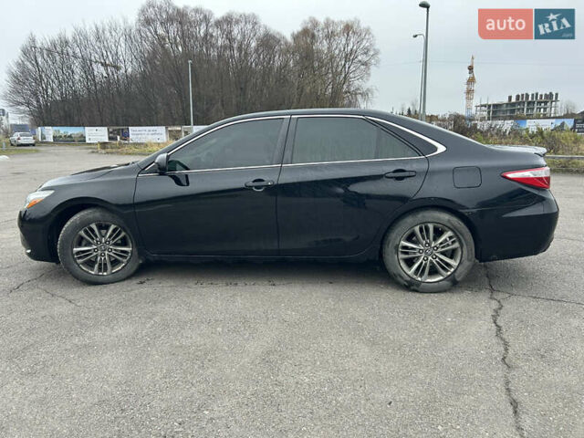 Чорний Тойота Камрі, об'ємом двигуна 2.49 л та пробігом 174 тис. км за 12500 $, фото 2 на Automoto.ua
