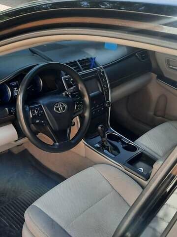 Черный Тойота Камри, объемом двигателя 2.49 л и пробегом 200 тыс. км за 13850 $, фото 1 на Automoto.ua