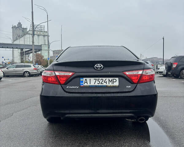 Черный Тойота Камри, объемом двигателя 2.5 л и пробегом 143 тыс. км за 12900 $, фото 4 на Automoto.ua