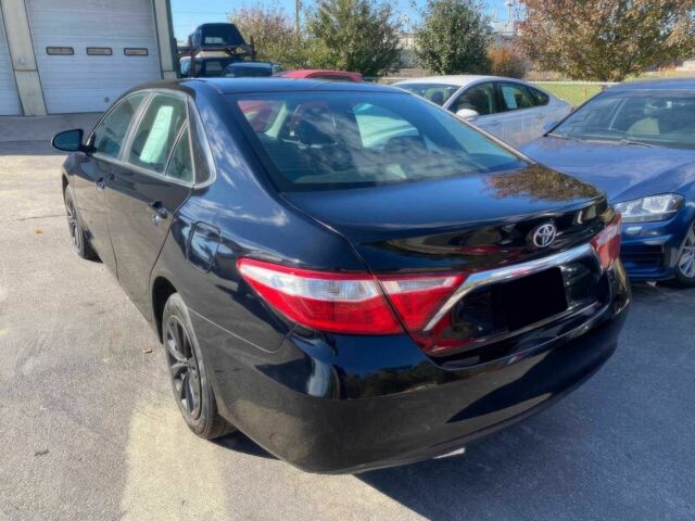 Черный Тойота Камри, объемом двигателя 2.5 л и пробегом 73 тыс. км за 5300 $, фото 4 на Automoto.ua