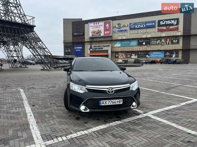 Черный Тойота Камри, объемом двигателя 2.5 л и пробегом 165 тыс. км за 16600 $, фото 7 на Automoto.ua