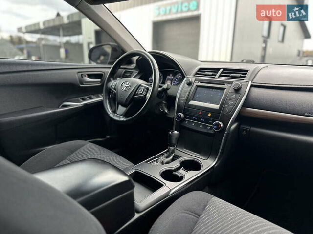Чорний Тойота Камрі, об'ємом двигуна 2.49 л та пробігом 185 тис. км за 14500 $, фото 14 на Automoto.ua