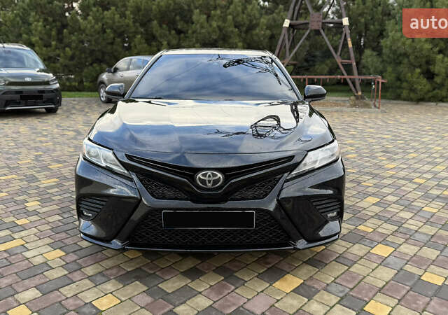 Черный Тойота Камри, объемом двигателя 2.49 л и пробегом 155 тыс. км за 18999 $, фото 1 на Automoto.ua