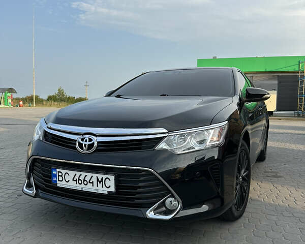 Черный Тойота Камри, объемом двигателя 2.49 л и пробегом 121 тыс. км за 16500 $, фото 1 на Automoto.ua
