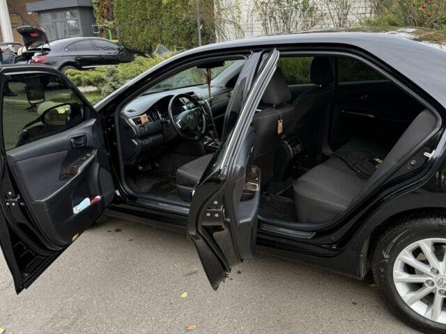 Черный Тойота Камри, объемом двигателя 2.5 л и пробегом 133 тыс. км за 18700 $, фото 14 на Automoto.ua