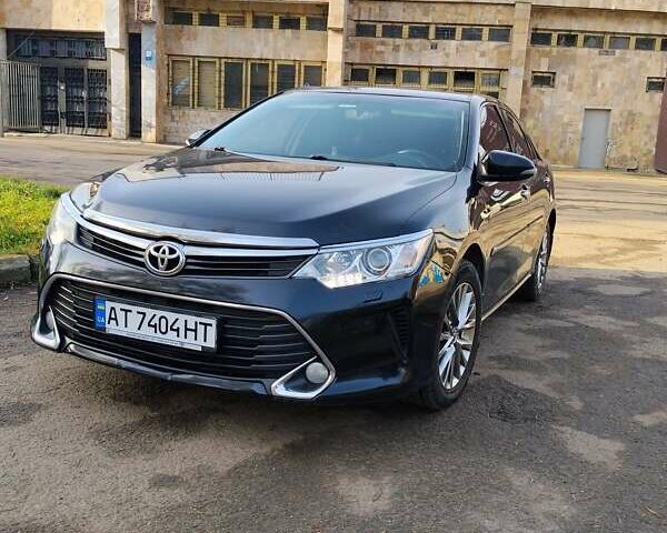 Чорний Тойота Камрі, об'ємом двигуна 2.5 л та пробігом 210 тис. км за 15950 $, фото 1 на Automoto.ua
