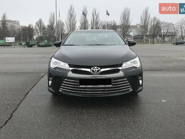 Черный Тойота Камри, объемом двигателя 2.5 л и пробегом 130 тыс. км за 15200 $, фото 1 на Automoto.ua