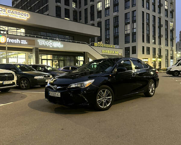 Черный Тойота Камри, объемом двигателя 2.49 л и пробегом 142 тыс. км за 16000 $, фото 1 на Automoto.ua