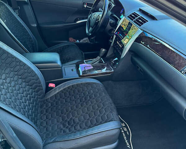 Черный Тойота Камри, объемом двигателя 2.49 л и пробегом 143 тыс. км за 17300 $, фото 5 на Automoto.ua