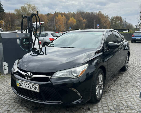 Черный Тойота Камри, объемом двигателя 2.5 л и пробегом 102 тыс. км за 15300 $, фото 1 на Automoto.ua