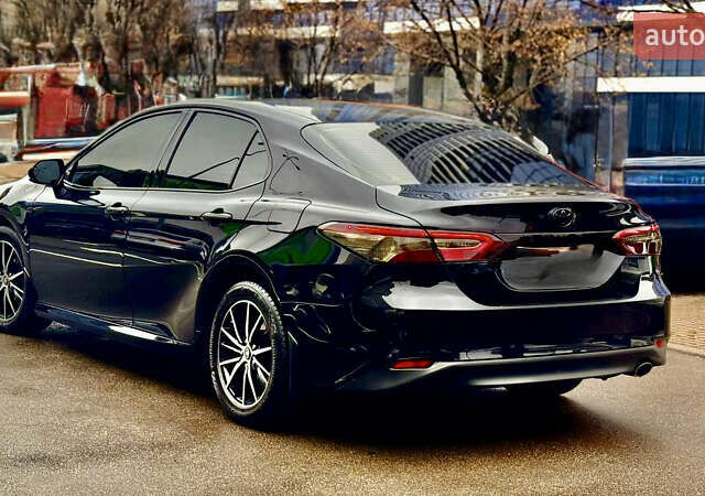 Черный Тойота Камри, объемом двигателя 2.5 л и пробегом 77 тыс. км за 25600 $, фото 3 на Automoto.ua