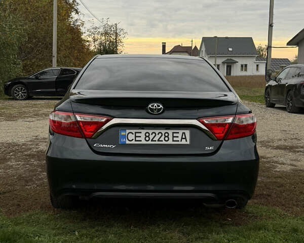 Чорний Тойота Камрі, об'ємом двигуна 2.49 л та пробігом 176 тис. км за 14500 $, фото 5 на Automoto.ua