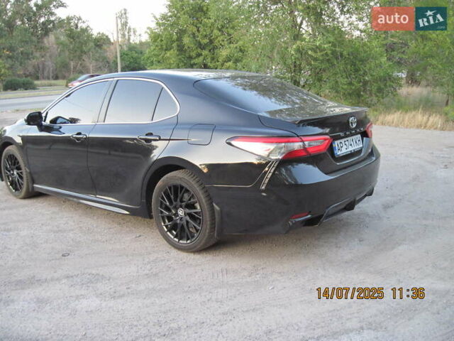 Чорний Тойота Камрі, об'ємом двигуна 2.49 л та пробігом 132 тис. км за 19900 $, фото 4 на Automoto.ua