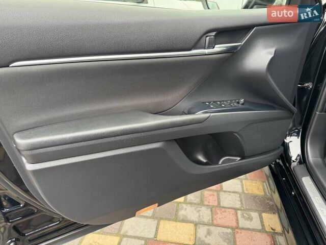 Чорний Тойота Камрі, об'ємом двигуна 2.49 л та пробігом 148 тис. км за 19800 $, фото 23 на Automoto.ua
