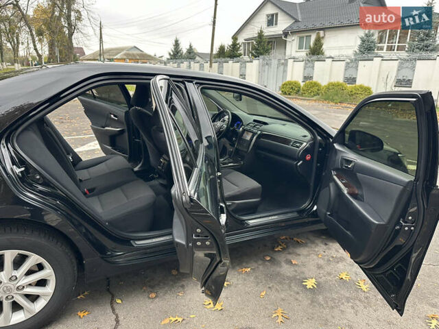 Чорний Тойота Камрі, об'ємом двигуна 2.49 л та пробігом 149 тис. км за 16999 $, фото 58 на Automoto.ua