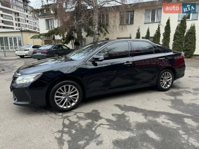 Черный Тойота Камри, объемом двигателя 2.49 л и пробегом 195 тыс. км за 19000 $, фото 1 на Automoto.ua