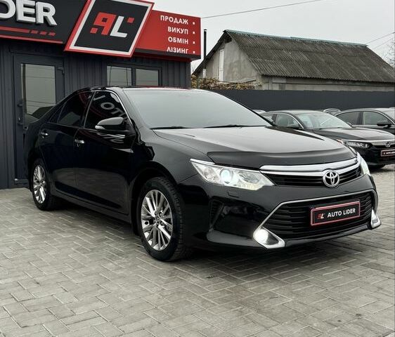 Черный Тойота Камри, объемом двигателя 2.5 л и пробегом 168 тыс. км за 16700 $, фото 1 на Automoto.ua