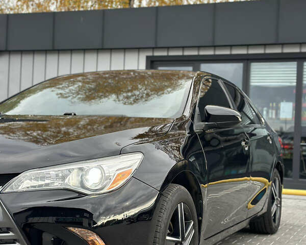 Чорний Тойота Камрі, об'ємом двигуна 2.49 л та пробігом 185 тис. км за 14500 $, фото 7 на Automoto.ua