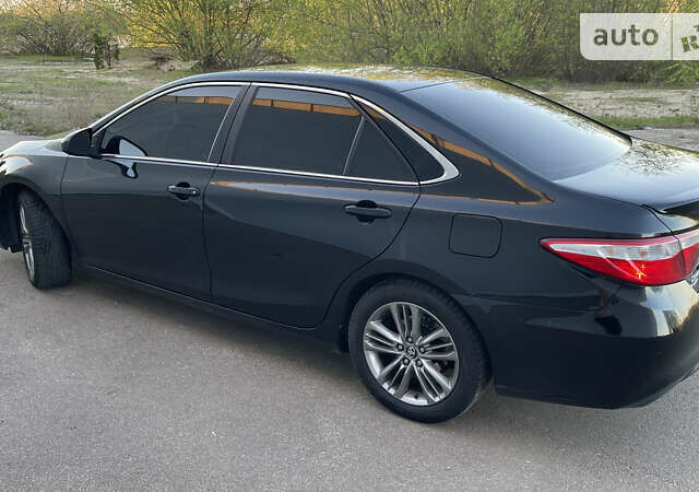 Черный Тойота Камри, объемом двигателя 2.49 л и пробегом 150 тыс. км за 14499 $, фото 2 на Automoto.ua
