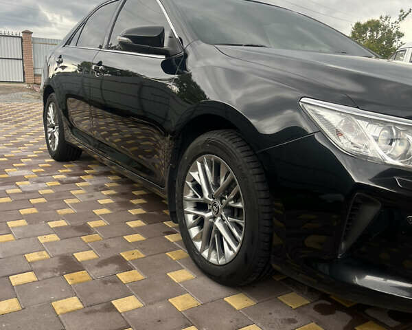 Черный Тойота Камри, объемом двигателя 2.5 л и пробегом 212 тыс. км за 16500 $, фото 11 на Automoto.ua
