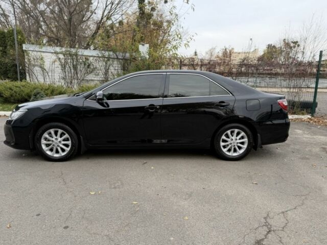 Черный Тойота Камри, объемом двигателя 2.5 л и пробегом 133 тыс. км за 18700 $, фото 2 на Automoto.ua
