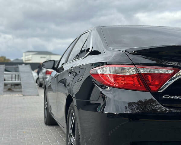 Чорний Тойота Камрі, об'ємом двигуна 2.49 л та пробігом 185 тис. км за 14500 $, фото 4 на Automoto.ua