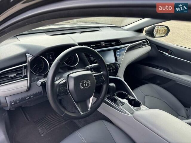 Черный Тойота Камри, объемом двигателя 2.5 л и пробегом 167 тыс. км за 18000 $, фото 19 на Automoto.ua