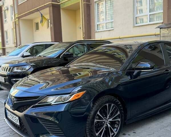 Чорний Тойота Камрі, об'ємом двигуна 2.49 л та пробігом 115 тис. км за 18500 $, фото 1 на Automoto.ua