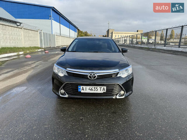 Черный Тойота Камри, объемом двигателя 2.49 л и пробегом 170 тыс. км за 17000 $, фото 1 на Automoto.ua