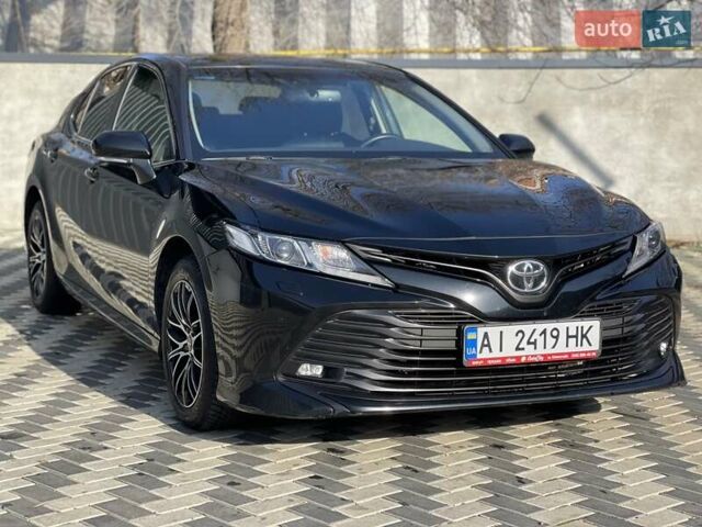 Черный Тойота Камри, объемом двигателя 2.49 л и пробегом 148 тыс. км за 19800 $, фото 2 на Automoto.ua