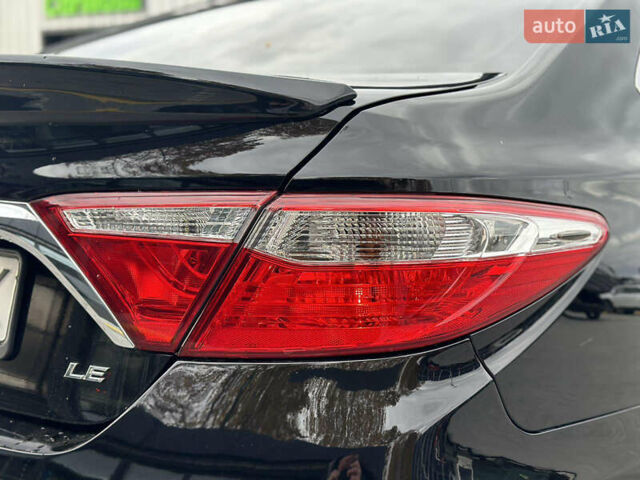 Чорний Тойота Камрі, об'ємом двигуна 2.49 л та пробігом 185 тис. км за 14500 $, фото 10 на Automoto.ua