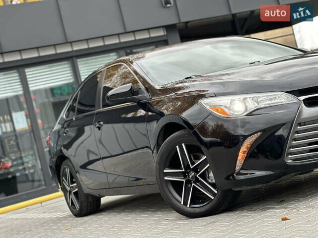 Чорний Тойота Камрі, об'ємом двигуна 2.49 л та пробігом 185 тис. км за 14500 $, фото 8 на Automoto.ua