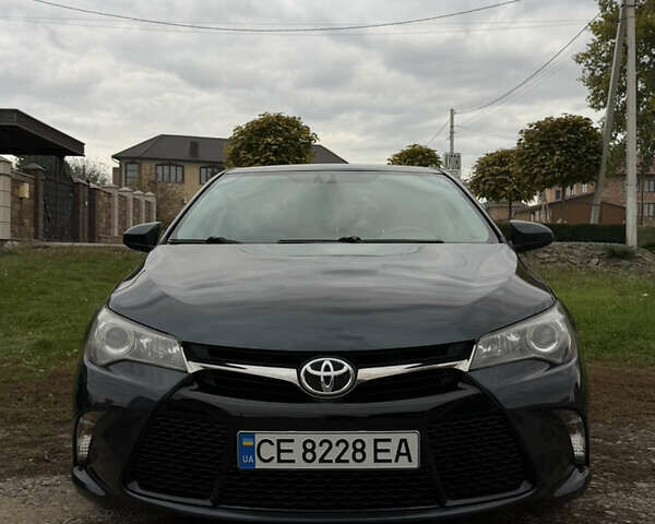 Чорний Тойота Камрі, об'ємом двигуна 2.49 л та пробігом 176 тис. км за 14500 $, фото 2 на Automoto.ua