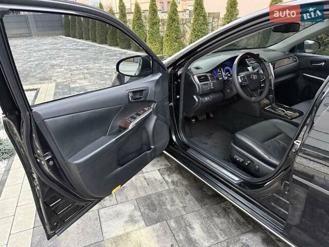 Черный Тойота Камри, объемом двигателя 2.49 л и пробегом 210 тыс. км за 16950 $, фото 32 на Automoto.ua