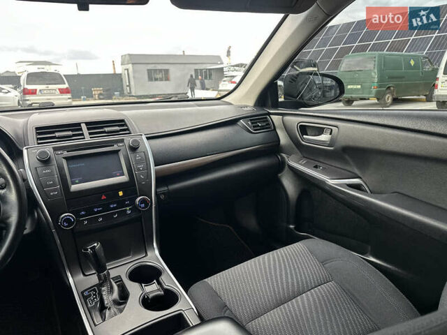 Чорний Тойота Камрі, об'ємом двигуна 2.49 л та пробігом 185 тис. км за 14500 $, фото 29 на Automoto.ua