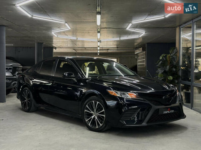 Черный Тойота Камри, объемом двигателя 2.49 л и пробегом 133 тыс. км за 18500 $, фото 1 на Automoto.ua