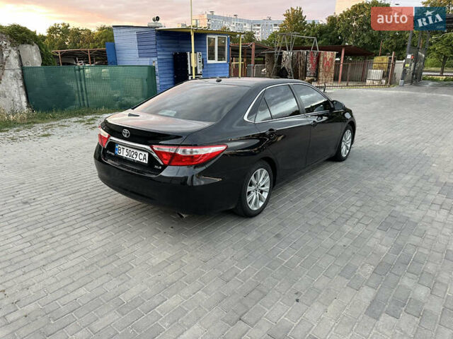 Чорний Тойота Камрі, об'ємом двигуна 2.49 л та пробігом 132 тис. км за 16000 $, фото 2 на Automoto.ua