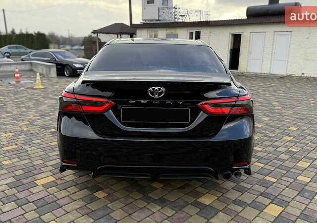 Черный Тойота Камри, объемом двигателя 2.49 л и пробегом 155 тыс. км за 18999 $, фото 4 на Automoto.ua